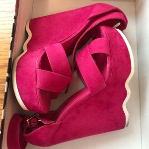 Fuschia strap around ankle shoes